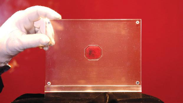 The material and age of a postage stamp
