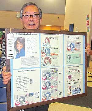 Stamp collector promotes hobby for youths