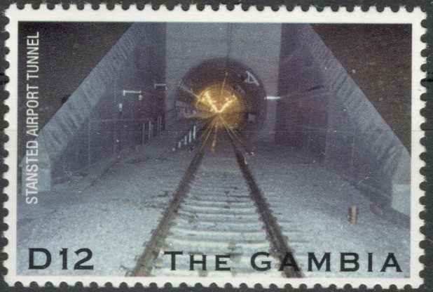 Gambian stamp celebrating Stansted Airport tunnel discovered