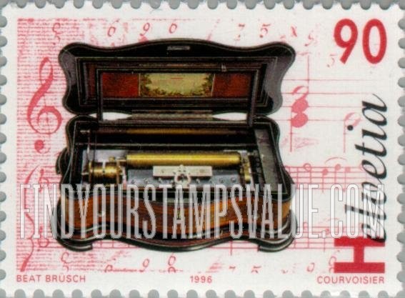 FindYourStampsValue: Federal Administration, Music Boxes and Automata: Basso-piccolo mandolin cylinder music box, by Eduard Jaccard