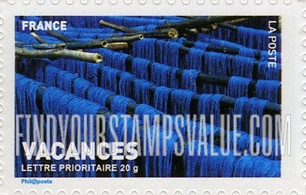 FindYourStampsValue: Vacations: Dyed wool hanging on rods