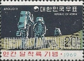 FindYourStampsValue: Astronauts Gathering Rock Samples on Moon