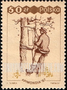 FindYourStampsValue: Beekeeper collecting honey