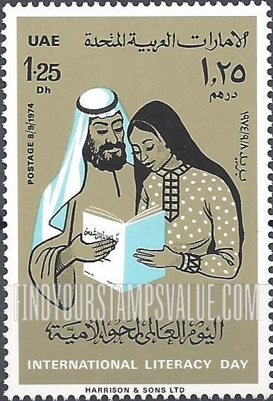 FindYourStampsValue: World Literacy Day: Man and woman reading book - اليوم العالمي لمحو الأمية: رجل وامرأة يقرءون كتاباً